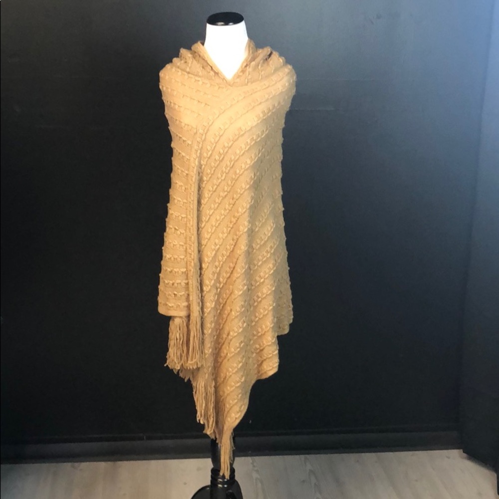 Cozy caramel colored hooded poncho with tassels